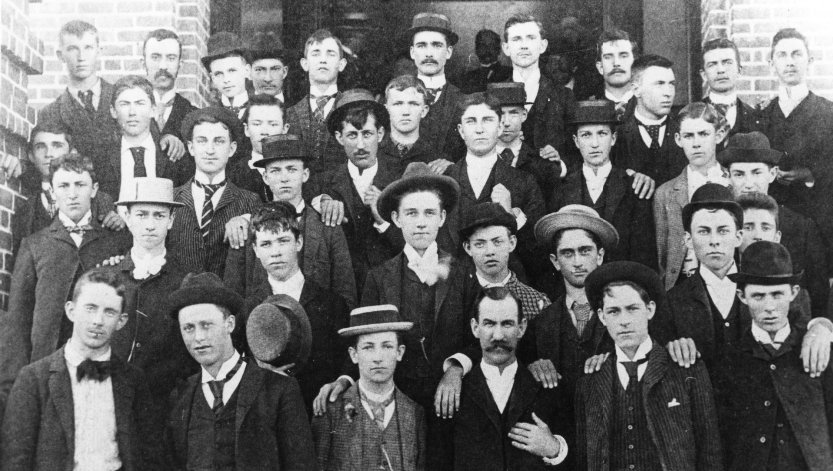 black and white photo of first graduating class at Holladay Hall